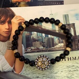 Freida rothman Elegant stretchy Black and Gold Beaded Bracelet